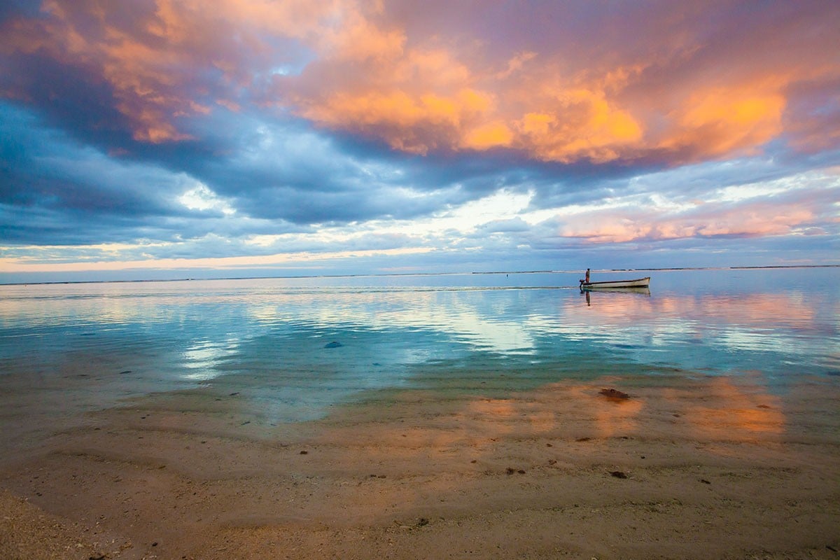 romantic tropical destinations mauritius sunrise reflection